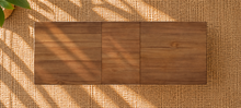 Load image into Gallery viewer, Cody extendable dining table in natural hazelnut brown acacia wood with rounded corners, curved legs and integrated butterfly extension.
