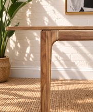 Load image into Gallery viewer, Cody extendable dining table in natural hazelnut brown acacia wood with rounded corners, curved legs and integrated butterfly extension.
