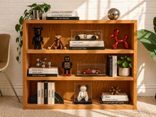 Load image into Gallery viewer, Natural pine three-tier open bookshelf with warm wood grain, wide shelves, and clean minimalist construction.
