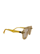 Load image into Gallery viewer, Transparent with Yellow Stem Glasses
