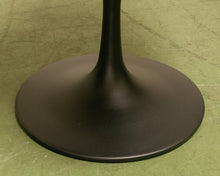 Load image into Gallery viewer, Modern Daisy upholstered chair with tapered back, rounded cushioned seat, and sculptural tulip-style pedestal base
