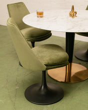 Load image into Gallery viewer, Modern Daisy upholstered chair with tapered back, rounded cushioned seat, and sculptural tulip-style pedestal base
