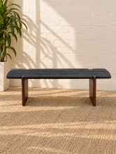Load image into Gallery viewer, Damian solid acacia wood coffee table with a charcoal rectangular top, rounded edges, and natural brown panel-style supports.
