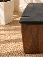 Load image into Gallery viewer, Damian solid acacia wood coffee table with a charcoal rectangular top, rounded edges, and natural brown panel-style supports.
