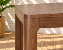 Load image into Gallery viewer, Darian rectangular dining table in warm walnut with natural Mindi wood grain, rounded corners and solid wood legs.
