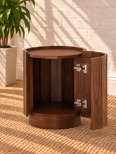 Load image into Gallery viewer, Darius side table in natural brown Mindi wood veneer with rounded edges, raised tray-style top, and concealed cabinet storage.
