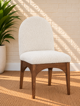 Load image into Gallery viewer, Davila Walnut dining side chair upholstered in Ivory Cloud cream bouclé with sculptural Art Deco wood frame
