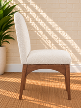 Load image into Gallery viewer, Davila Walnut dining side chair upholstered in Ivory Cloud cream bouclé with sculptural Art Deco wood frame
