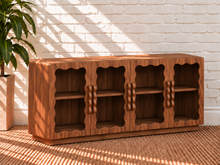Load image into Gallery viewer, Image 3 of 4: Duran 62-Inch 4-Door Glass Buffet Credenza in Brown Walnut with scalloped glass doors and wavy wood pulls
