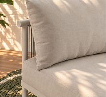 Load image into Gallery viewer, Elara curved outdoor sectional sofa in Warm Stone with plush cushions, slim aluminum frame, woven rope details, and two round nesting tables
