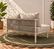 Load image into Gallery viewer, Elara right-arm outdoor sofa section in Warm Stone with curved cushioned seat, two back cushions, and slim aluminum frame
