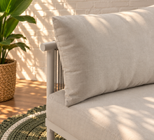 Load image into Gallery viewer, Elara right-arm outdoor sofa section in Warm Stone with curved cushioned seat, two back cushions, and slim aluminum frame
