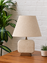 Load image into Gallery viewer, Image 1 of 6: Elio natural travertine table lamp with linen-textured shade and walnut wood base
