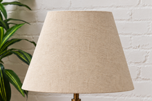 Load image into Gallery viewer, Image 4 of 6: Elio natural travertine table lamp with linen-textured shade and walnut wood base
