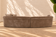 Load image into Gallery viewer, Ellie mocha beige curved two-piece sectional sofa with rounded arms, tight upholstered seat and back, and three coordinating throw pillows.


