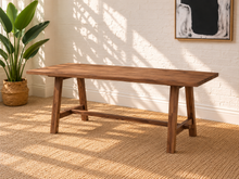 Load image into Gallery viewer, Felipe rectangular solid acacia dining table in natural brown with angled trestle legs, center stretcher and visible wood grain.
