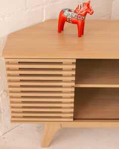 Lawford Blond Slat Corner Cabinet