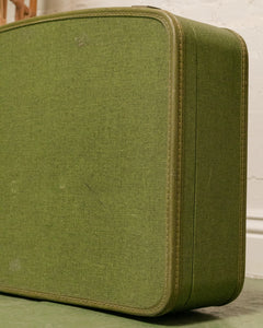 green vintage suitcase