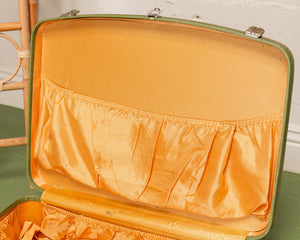 green vintage suitcase