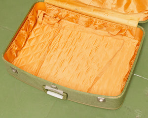 green vintage suitcase