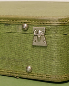 green vintage suitcase