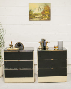 Pair of Black & Gold Glass Lowboy Dressers