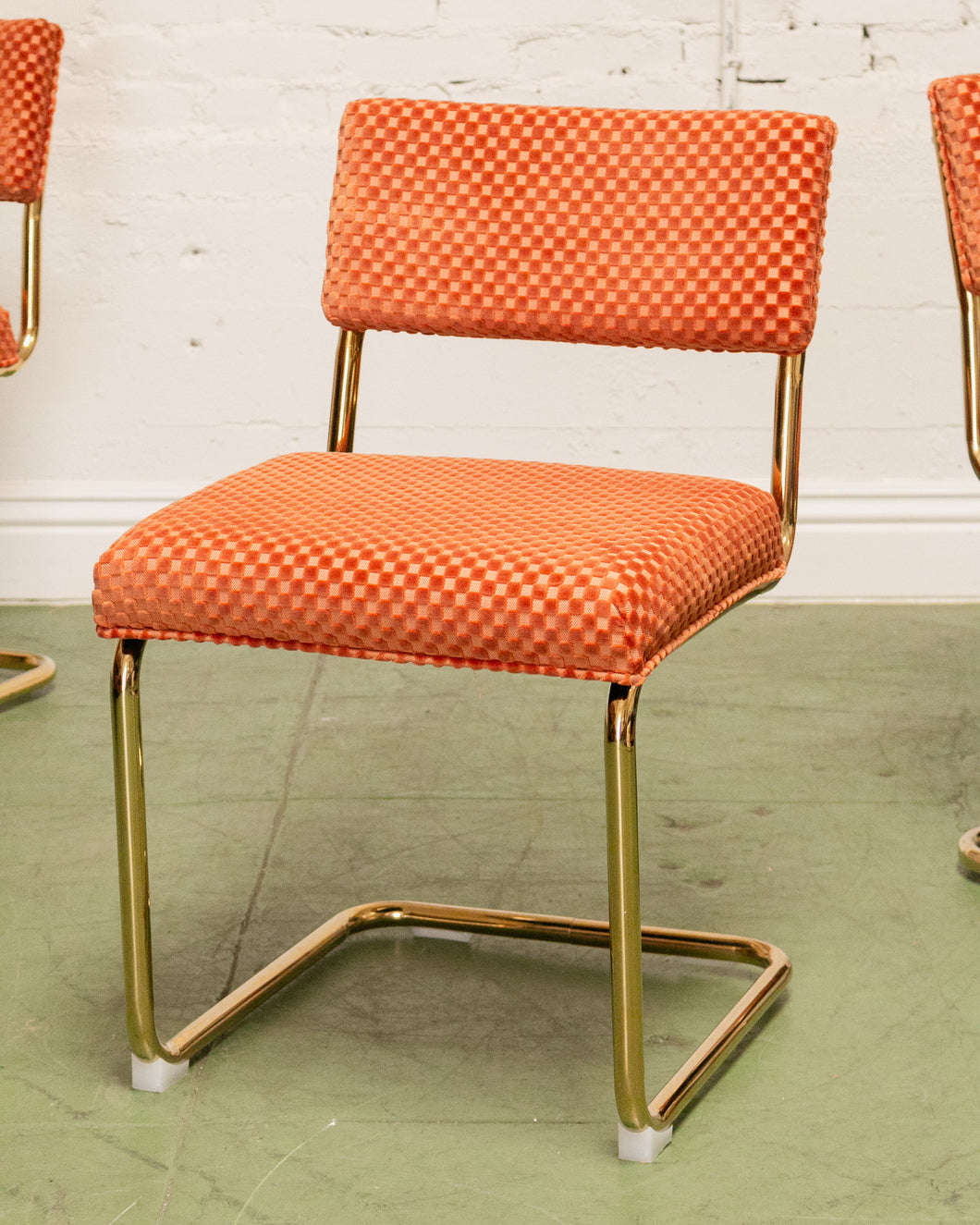 Checkered Cantilever Dining Chair in Rust Orange