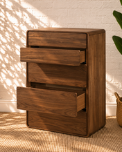Load image into Gallery viewer, Finley five-drawer dresser in warm walnut with natural wood grain, rounded corners and handle-free push-to-open drawer fronts.
