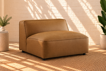 Load image into Gallery viewer, Florence three-piece modular sectional sofa in caramel vegan leather with deep seats, low backrests, and wide upholstered arms

