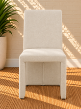 Load image into Gallery viewer, Foley upholstered dining chair in Ivory linen-textured fabric with sculptural fully upholstered frame
