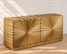 Load image into Gallery viewer, Gloria 4-Door Buffet Credenza in Radiant Gold with intricate hand-carved starburst doors and sculptural ridged detailing
