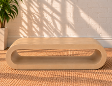 Load image into Gallery viewer, Gracielle Natural Oak coffee table with rounded continuous edges, elongated open center shelf, and sculptural contemporary design.
