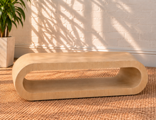 Load image into Gallery viewer, Gracielle Natural Oak coffee table with rounded continuous edges, elongated open center shelf, and sculptural contemporary design.
