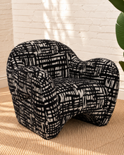Load image into Gallery viewer, Hadley black and beige patterned upholstered accent chair with rounded arms, curved back and sculptural arched base.
