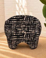 Load image into Gallery viewer, Hadley black and beige patterned upholstered accent chair with rounded arms, curved back and sculptural arched base.
