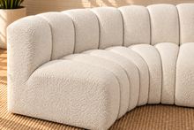 Load image into Gallery viewer, Hampton 4-piece sectional sofa in Creamy White boucle with deep channel tufting, rounded edges, curved seating, and contemporary modular design.

