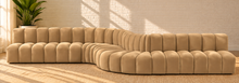 Load image into Gallery viewer, Hampton 8-piece arc sectional sofa in Honey Beige velvet with deep channel tufting and a sweeping curved modular configuration.
