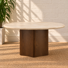 Load image into Gallery viewer, Harper round dining table with veined marble top and warm oak vertically fluted cylindrical pedestal base.
