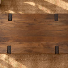 Load image into Gallery viewer, Hayden coffee table in natural brown mango wood with a rectangular top, rounded edges, visible joinery details, and broad panel-style legs.
