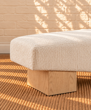 Load image into Gallery viewer, Hiera Blonde Oak dining bench upholstered in Cloud Ivory polyester fabric with sculptural wood base
