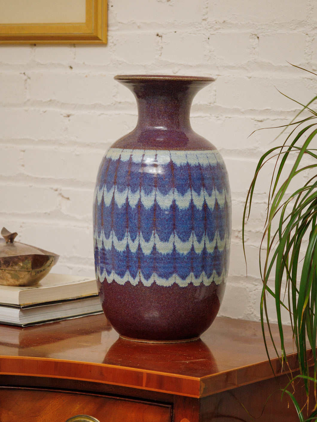 Glazed Earthenware Ovoid Vase With a Blue Hue Flambe Glaze