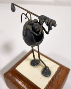 Golfer Figurine made of Metal on Wood Stand