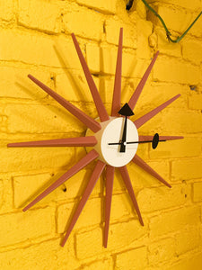 Modern Orange Sunburst Clock