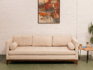 Sleek Oatmeal Mid Century Style Sofa