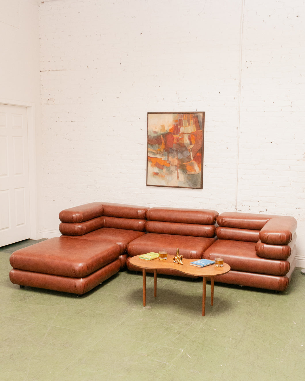 Elodie 4 Piece Modular Sectional in Saddle Brown Leather