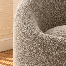 Load image into Gallery viewer, Jaden Moon Gray swivel accent chair with textured gray upholstery, rounded wraparound back, sloped arms and circular seat.
