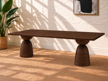 Load image into Gallery viewer, Jane warm brown mango wood dining table with rectangular rounded-edge top and two sculptural hourglass pedestal bases.
