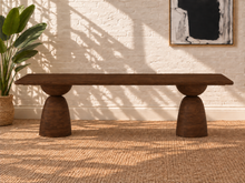 Load image into Gallery viewer, Jane warm brown mango wood dining table with rectangular rounded-edge top and two sculptural hourglass pedestal bases.
