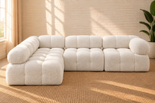 Load image into Gallery viewer, Janine 4-piece modular sectional sofa in Creamy White boucle with rounded cushions, deep tufting, and contemporary low-profile design.
