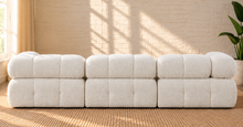Load image into Gallery viewer, Janine 4-piece modular sectional sofa in Creamy White boucle with rounded cushions, deep tufting, and contemporary low-profile design.
